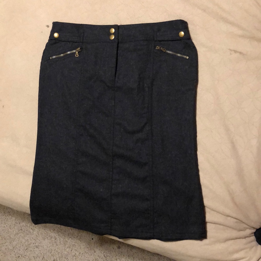Express 56% wool knee length skirt.
